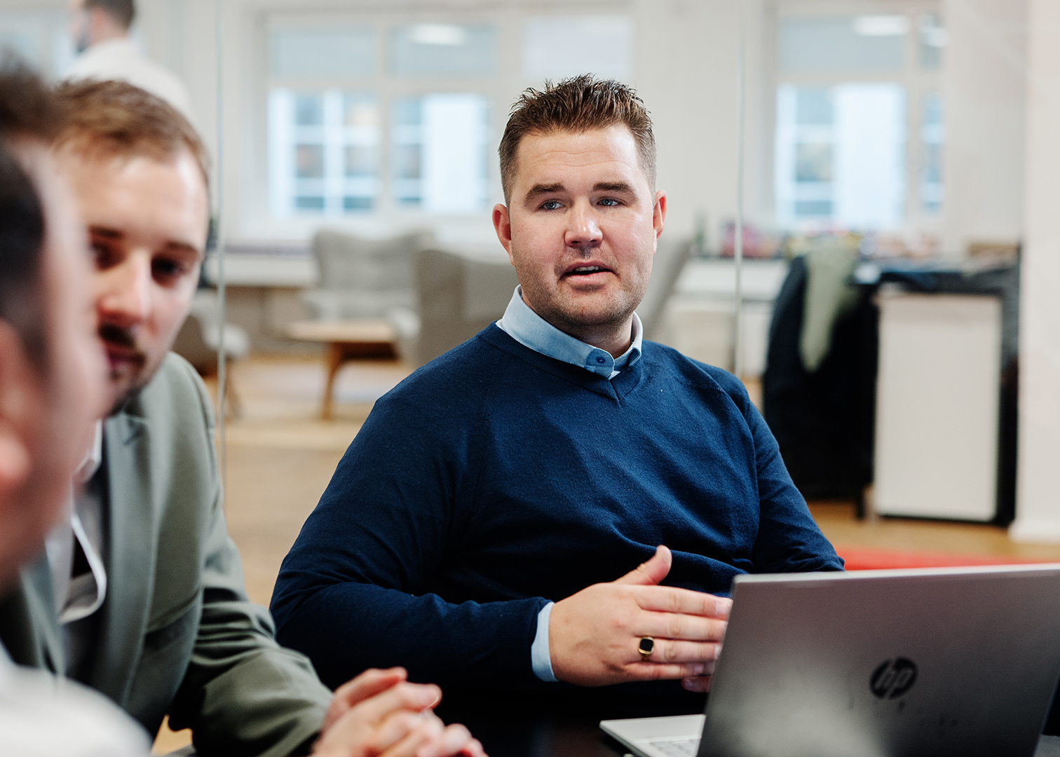 Employees working together in a meeting room